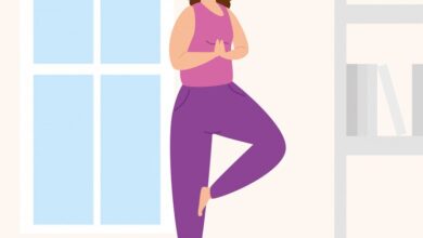 Women practicing the best yoga poses for weight loss in a serene studio setting.
